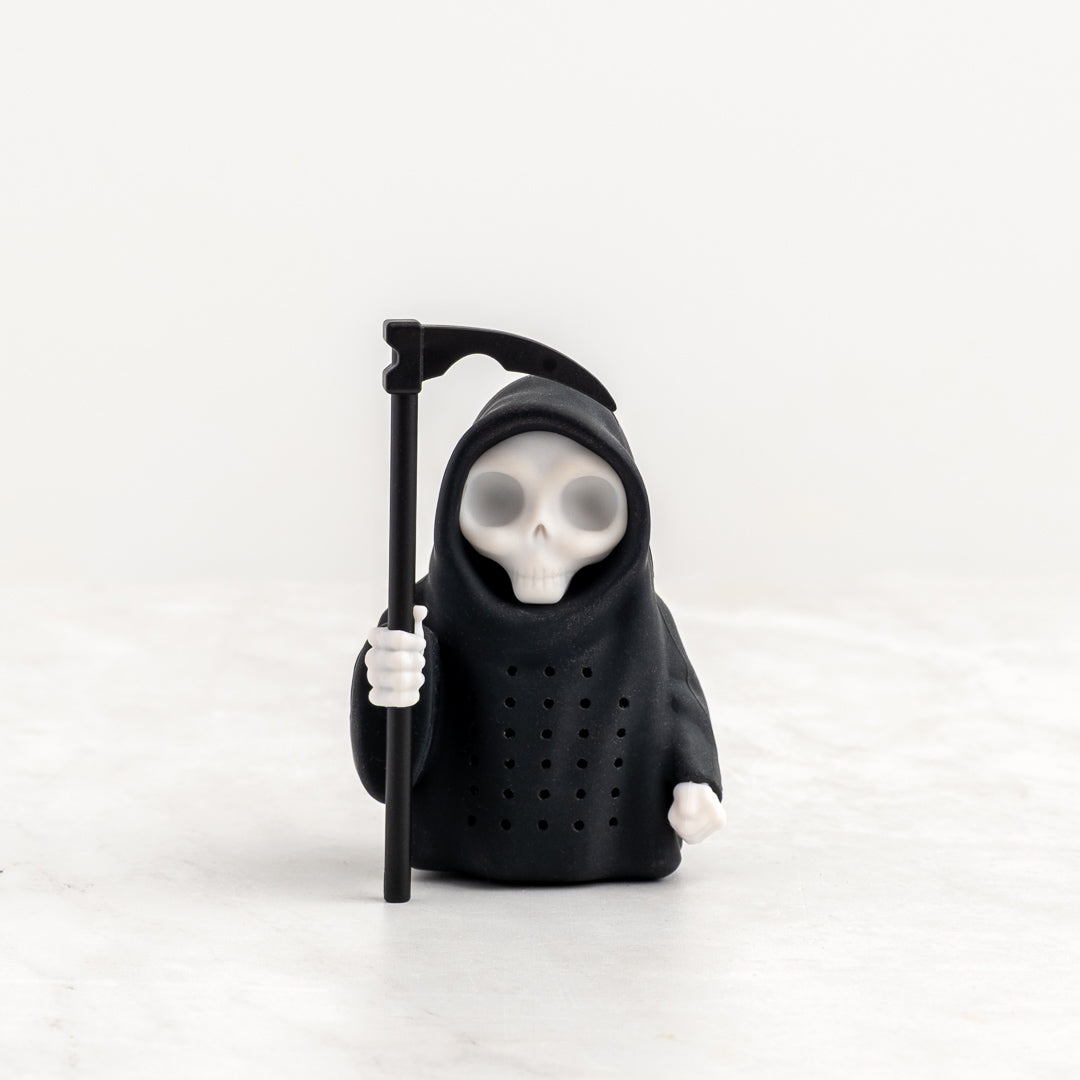 Grim steeper infuser with a black hood holding a scythe on a white background