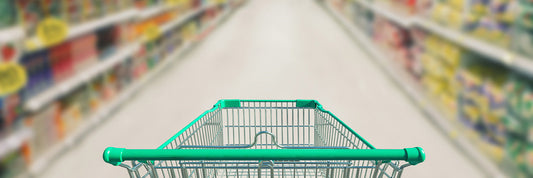 Grocery cart shopping in grocery store