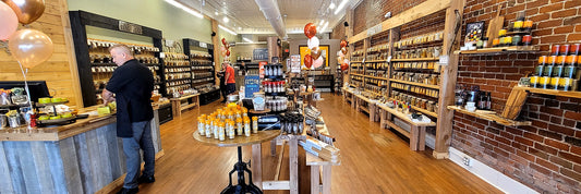 Inside of a The Spice & Tea Exchange during a grand opening.