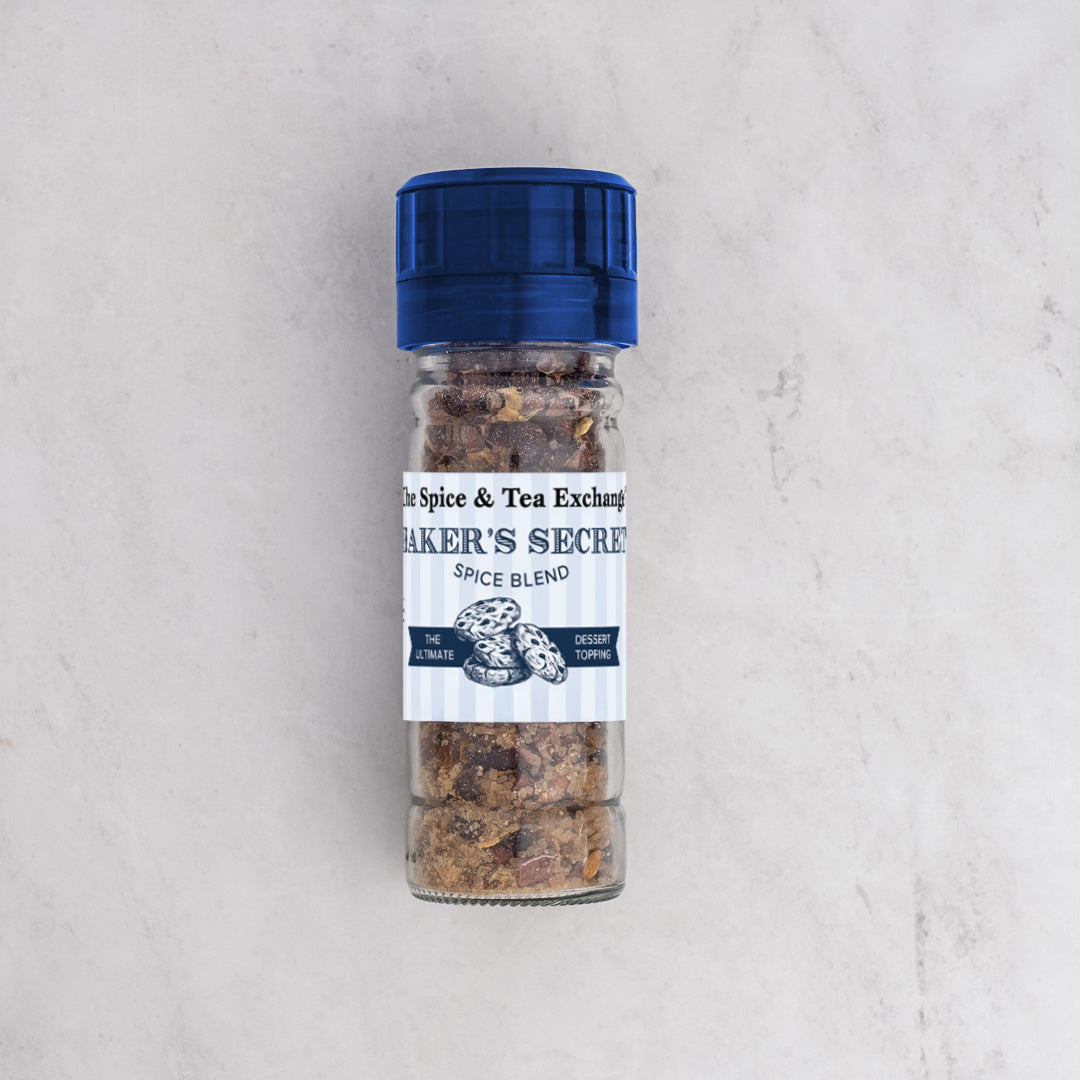 Baker's Secret spice blend container on a light gray background