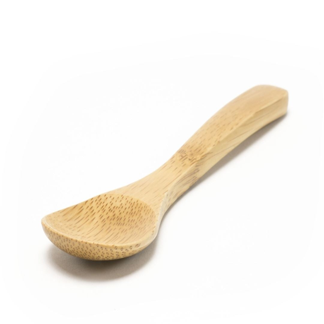 The Bamboo Salt Spoon Mini is a light-colored, Moso bamboo spoon with a rounded bowl and smooth handle—ideal for salt accessories.