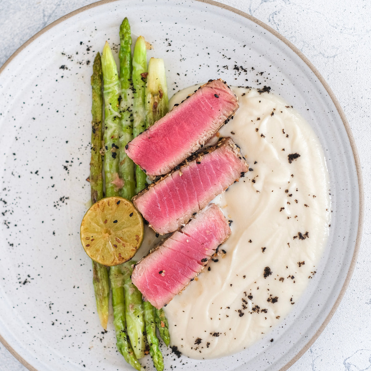 Black Lava Sea Salt on asparagus and tuna slices