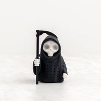 Grim steeper infuser with a black hood holding a scythe on a white background