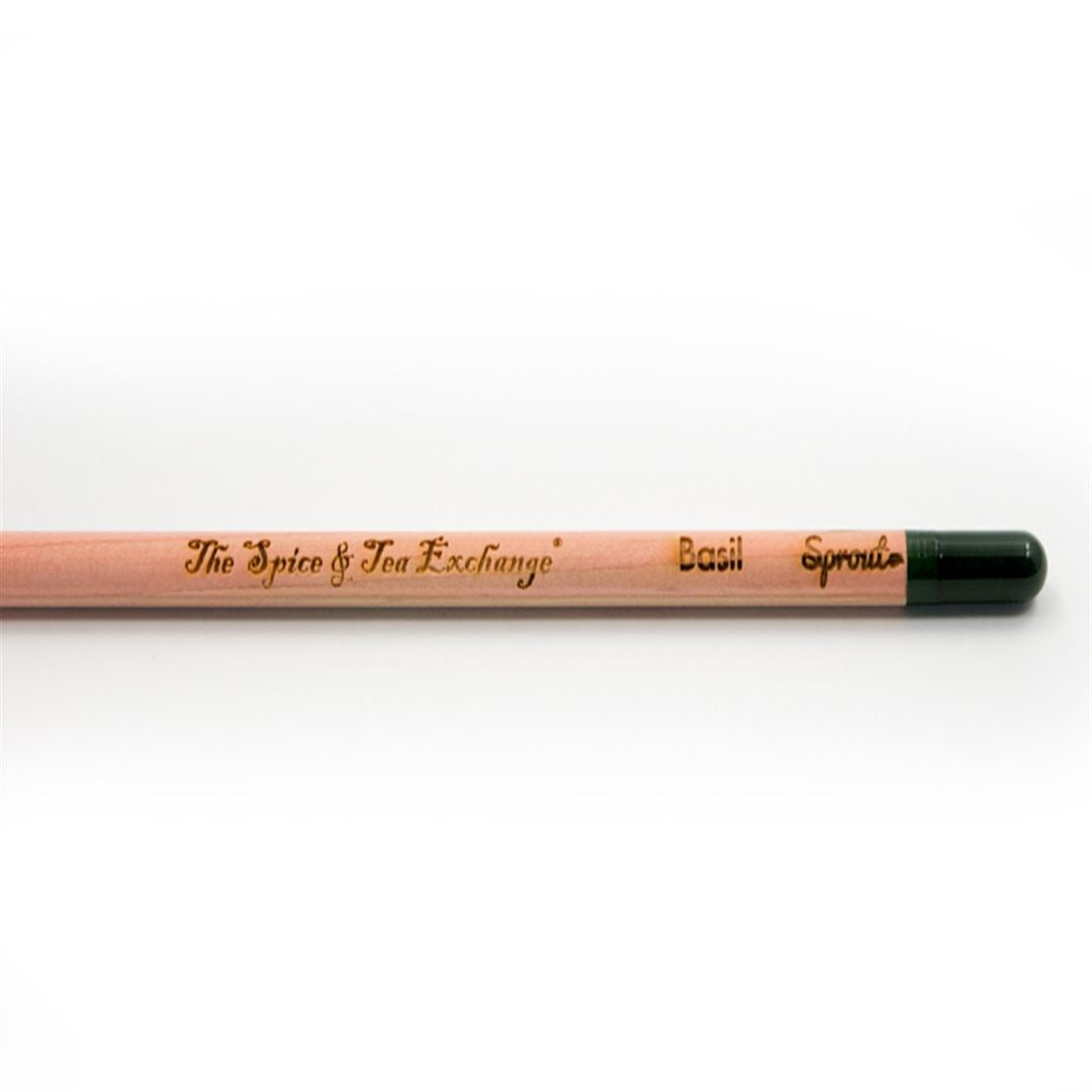 A close-up of a Herb Pencil labeled “The Spice & Tea Exchange,” “Basil,” and “Sprout.” Its green end holds a seed capsule, making this sustainable, plantable pencil eco-friendly—perfect for growing fresh herbs.