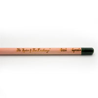 A close-up of a Herb Pencil labeled “The Spice & Tea Exchange,” “Basil,” and “Sprout.” Its green end holds a seed capsule, making this sustainable, plantable pencil eco-friendly—perfect for growing fresh herbs.