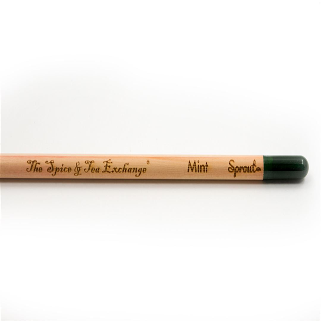 Herb Pencils are sustainable, plantable pencils featuring a green seed capsule and engraved with The Spice & Tea Exchange, Mint, and Sprout, shown on a plain white background.