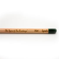 Herb Pencils are sustainable, plantable pencils featuring a green seed capsule and engraved with The Spice & Tea Exchange, Mint, and Sprout, shown on a plain white background.