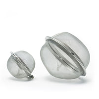 Two Mesh Ball Infusers of different sizes stand upright on a white background, with the larger infuser on the right and the smaller on the left.