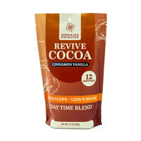 A 6.77 oz (192g) standing pouch of Revive Cocoa Cinnamon Vanilla, a daytime blend with cordyceps and lion’s mane mushrooms, contains 12 servings.