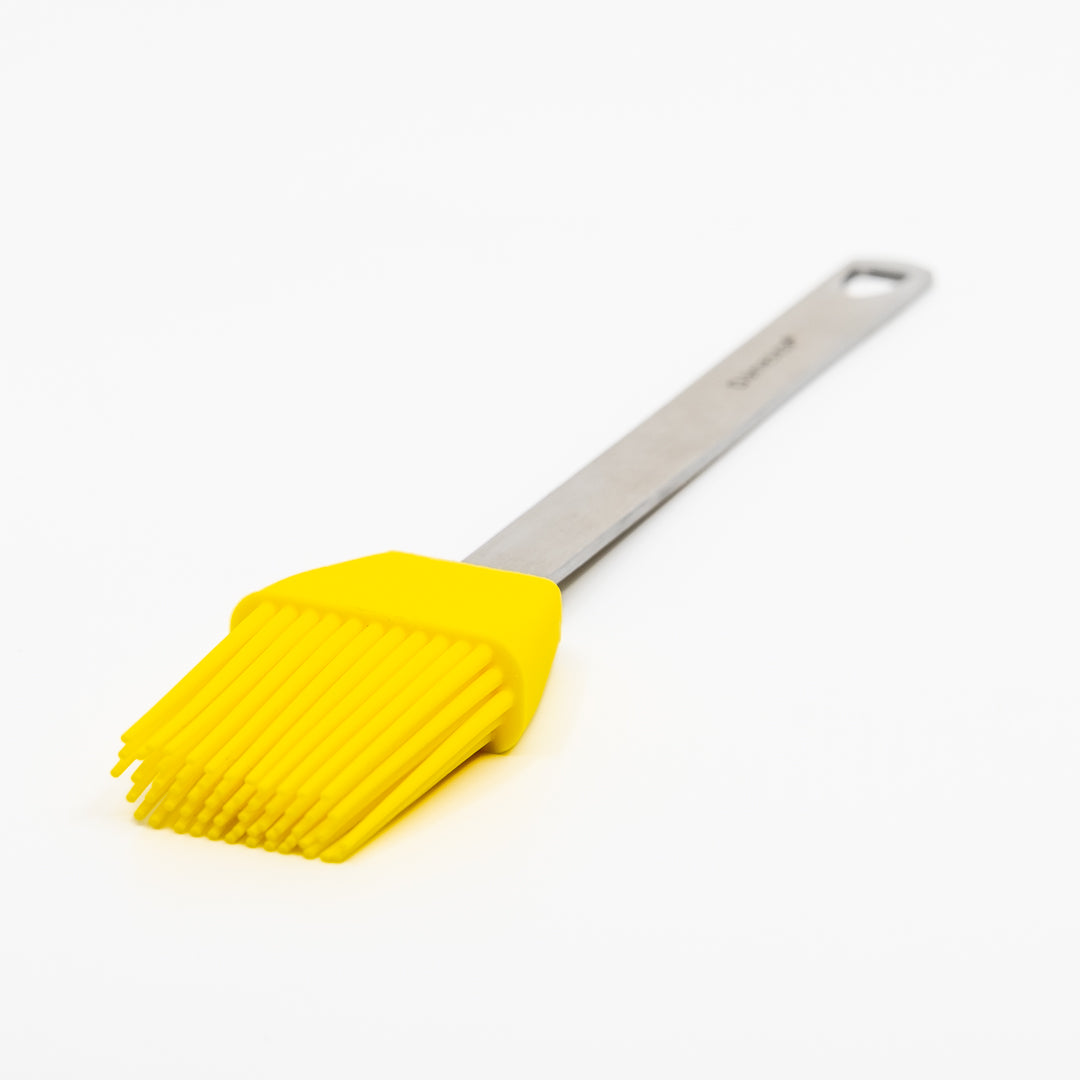 Mini Basting Brushes feature yellow silicone bristles and a silver metal handle, making them ideal for grilling gifts or essential basting tasks. Shown here on a white background.