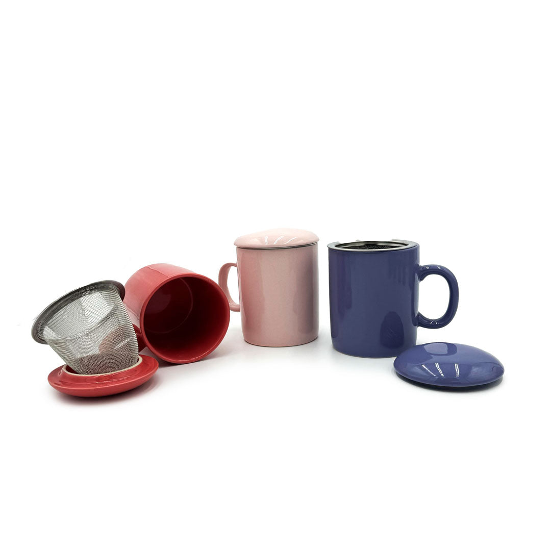 Set of colorful mugs with various features on a white background