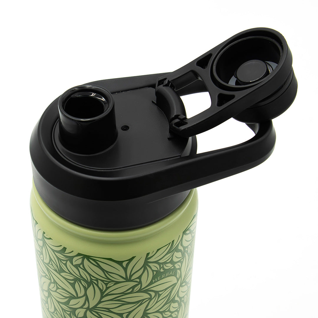 The Tea Leaf Travel Infuser Tumbler is a green reusable tumbler with a leafy pattern and a black flip-top lid, shown open to reveal the spout and attached cap.
