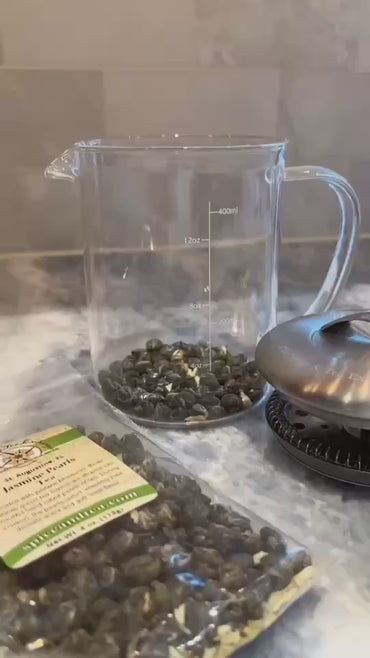 Video of Jasmine Pearls Tea steeping - unfurling as time goes on.